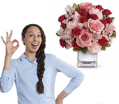 A girl celebrating a sale promotion of the flower arrangements