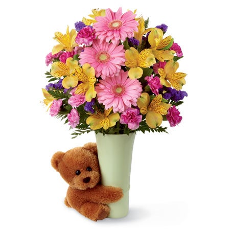 A Bouquet of Pink Gerbera Daisies, Yellow Peruvian Lilies, Fuchsia Mini Carnations and Purple Statice in a Floral Vase with a Keepsake Teddy Bear