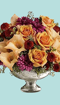 Centerpiece Flower Arrangement using bright colors of flowers