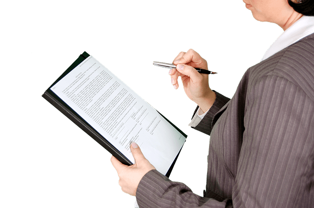 A Woman Reviewing the Contents of the Paper before Signing it