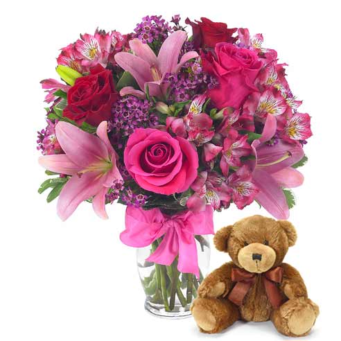 A Bouquet of Pink And Red Roses, Blush Asiatic Lilies and Light-Pink Alstroemeria in a Glass Vase with Bow with Plush Teddy