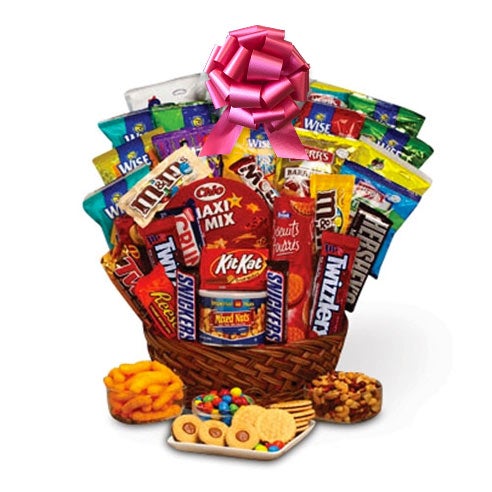 Sweet and Salty gift basket including Chocolate, Chips, Cookies, Candies, Licorice, Peanut Butter Cups, Savory Snacks and Sweet Treats in a Pink Decorative Bow