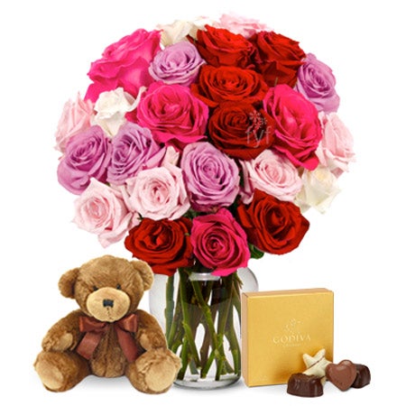 teddy bear with chocolate and roses