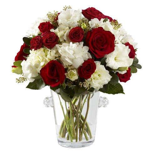 A Bouquet of Red Roses, Red Spray Roses, White Hydrangea and White Lisianthus in a Champagne Vase