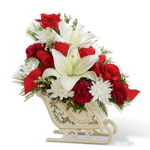 Unique Christmas flower arrangement delivered in a sleigh