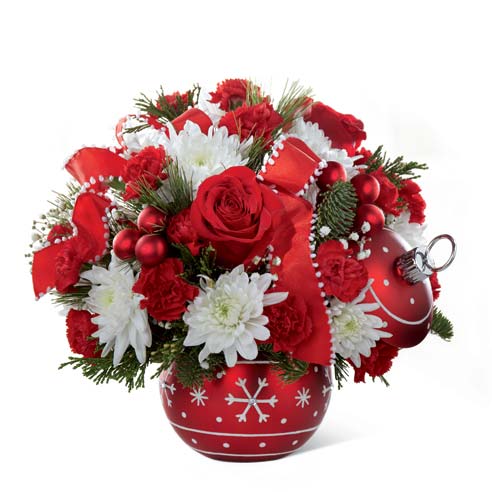 Christmas flowers in holiday ornament vase