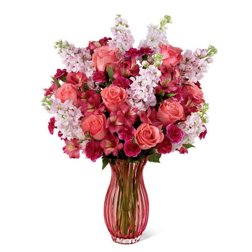 Coral flower bouquet with coral roses, fuchsia carnations, pink Peruvian lilies
