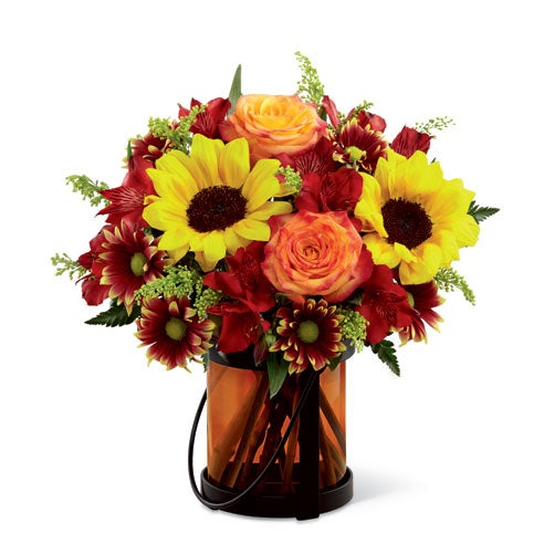 Sunflowers and orange roses in this sunflower bouquet from sendflowers