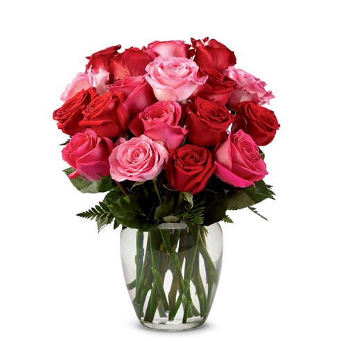 A Bouquet of Red Roses, Pink Roses, Hot-Pink Roses and Lush Greens in a Clear Glass Vase
