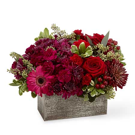 Red rose and hot pink gerbera daisy basket bouquet