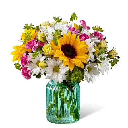 Sunflower, white daisy and pink carnations in a unique vase