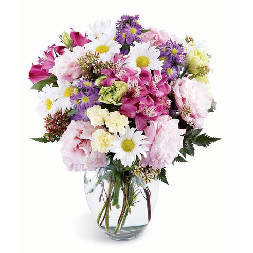 White daisies, pink alstroemeria and purple lisianthks in a mixed bouquet