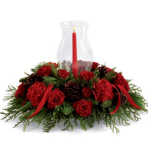 Red candle centerpiece with red roses and red carnations