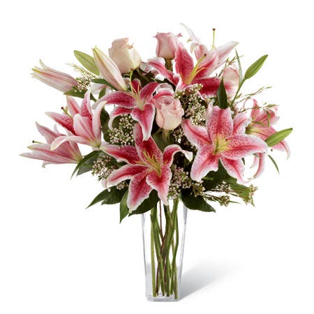 Pink stargazer lilies with pink roses