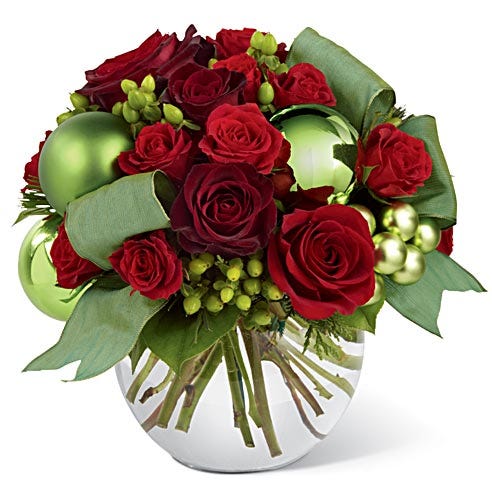 Unique holiday bouquet with red roses and spray roses with hypericum berries