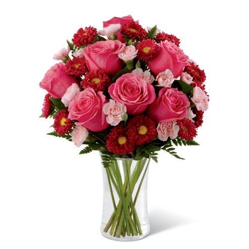 A Bouquet of Hot Pink Roses, Pink Mini Carnation, and Red Matsumoto Asters in a glass vase