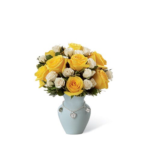 New baby boy arrangement with yellow roses and white spray roses