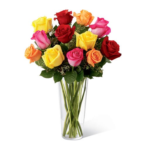 A Bouquet of Hot Pink, Orange, Yellow, and Red Roses in a Clear Glass Vase