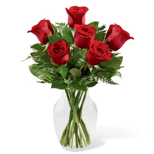 A Bouquet of 6 Red Roses  and Fresh Greens in a Clear Glass Vase