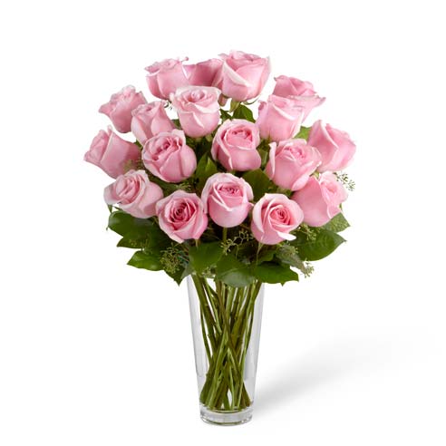 Long stem pink rose bouquet in glass vase