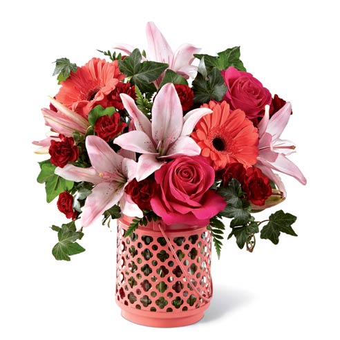 Coral daisy, pink lily, and pink and red rose bouquet