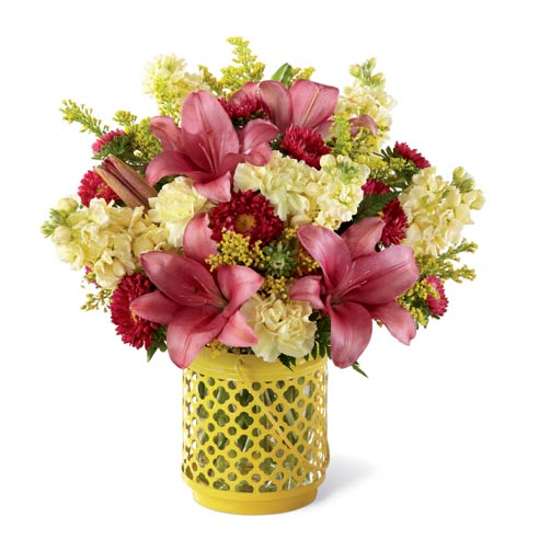 Pink lily bouquet with yellow carnations