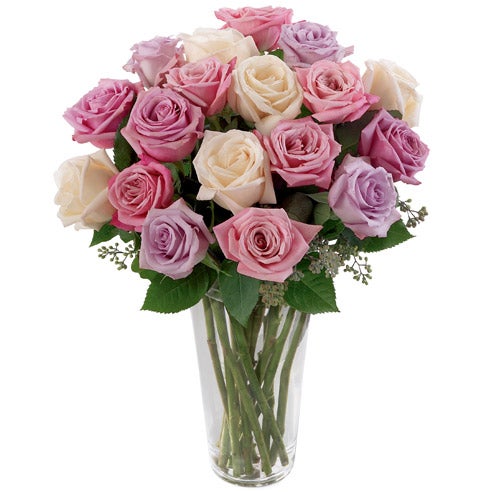 A Bouquet of  Long-Stem Pale Pink, Cream, And Lavender Roses in a Clear Glass Vase