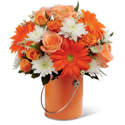 A Bouquet of  Orange Gerbera Daisies, Orange Roses, Lush Greens and White Chrysanthemums in a Decorative Orange Vase with Card Message