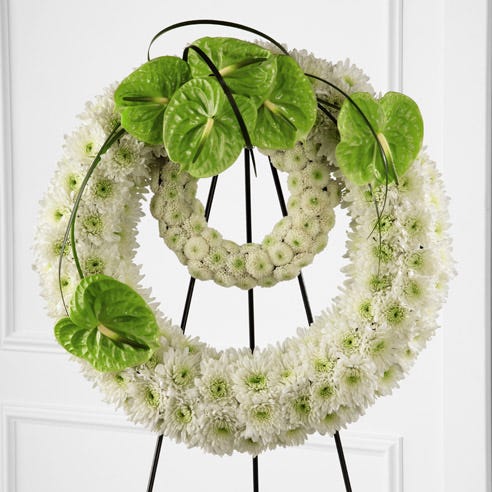 Sympathy white flower wreath standing spray