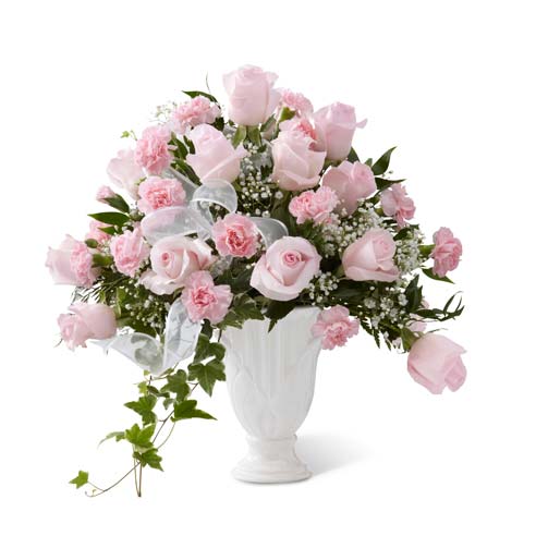 Sympathy pedestal vase with light pink roses and carnations with baby's breath