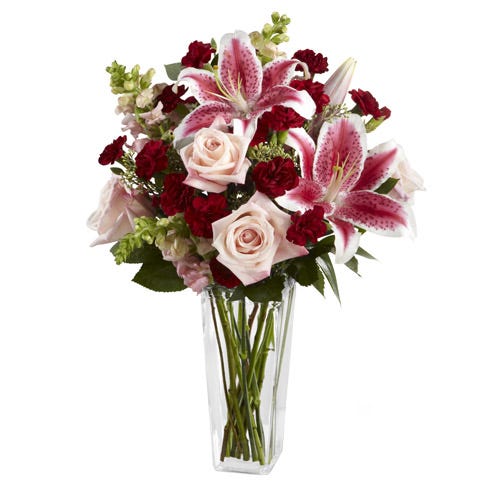 Pale pink roses, Stargazer lilies and burgundy mini carnations bouquet
