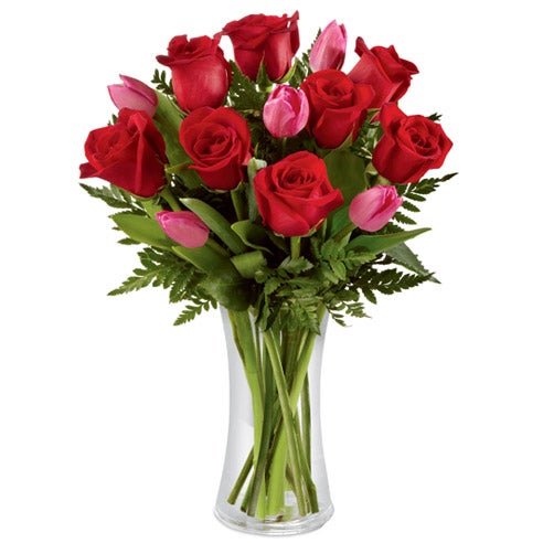 A Bouquet of Dark-Red Roses, Fuchsia Tulips and Lush Greens in a Clear Glass Vase with Card Message