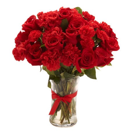 Red carnations and roses arrangement bouquet