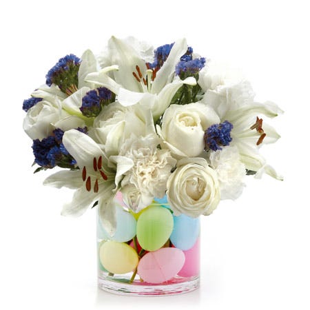 cheap easter flowers delivered in a white rose and lily egg flower bouquet