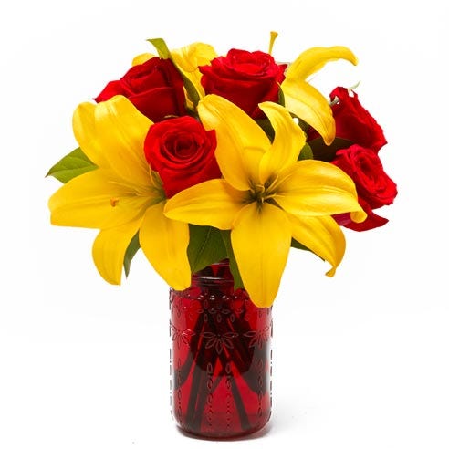 yellow lily red rose bouquet with yellow lilies and red roses 