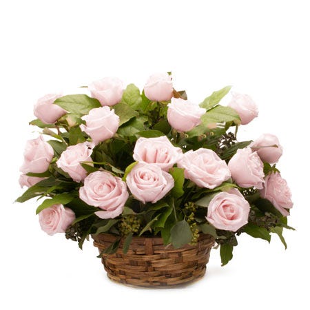 Pink rose basket bouquet with pink roses, woven basket and card message
