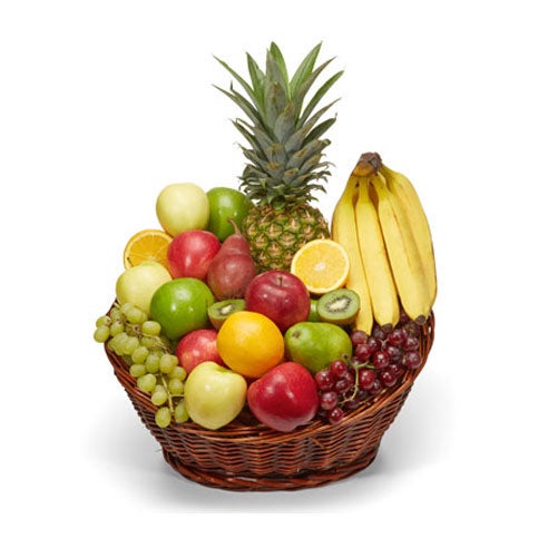 A basket of fresh fruits including green apples, red apples, red and green grapes, banana, pineapple, oranges, pears and kiwi