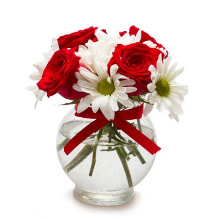 A Bouquet of Red Roses and White Daisies in a Mini Glass Vase with Card