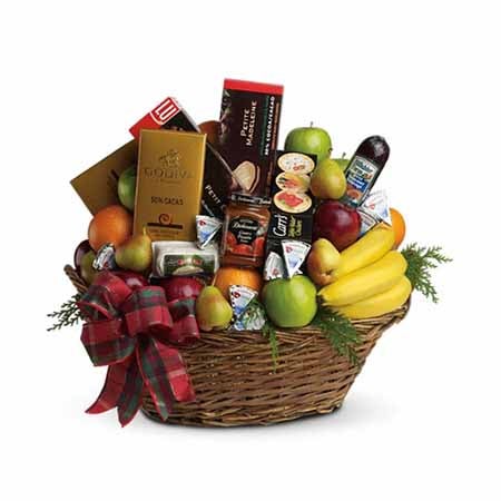 Assorted Seasonal Fruits, Cheeses And Crackers, Premium Chocolate Bars, Sausage, Cookies with Cute Tied Bow in a basket