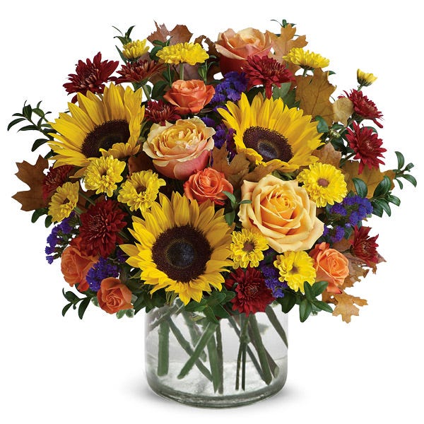 Country farm sunflower, peach rose and mini orange roses bouquet