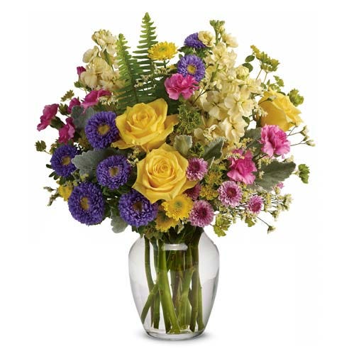 spring flower bouquet in a clear glass vase for same day flower delivery online