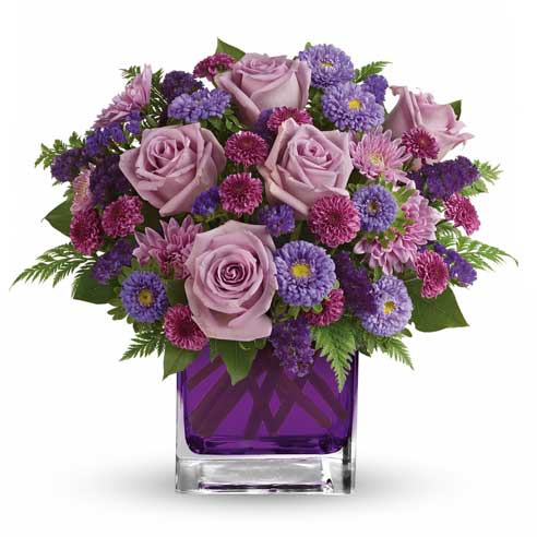 Mixed lavender roses and purple button spray chrysanthemums bouquet