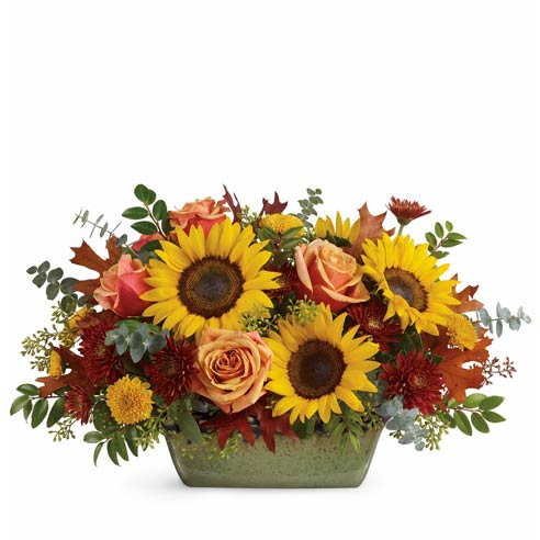 Sunflower centerpiece with orange roses, yellow mums and burgundy chrysanthemums
