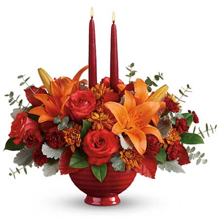 Fall flower candle centerpiece with dark orange rose, orange tiger lily and candles