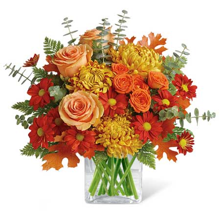 Fall orange flower bouquet with pale orange roses and orange chrysanthemums