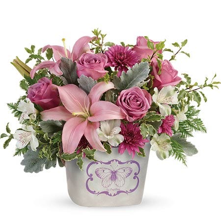 Pink lily lavender roses bouquet in a butterfly print keepsake vase