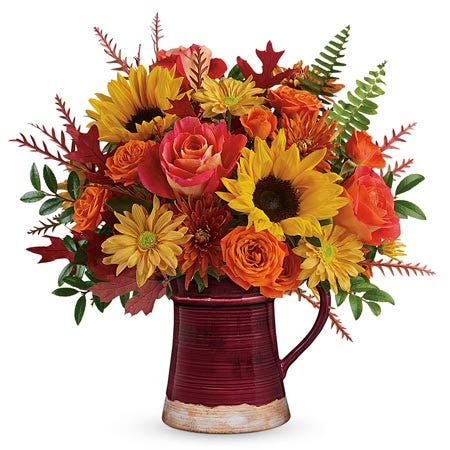 Orange rose and sunflower mug arrangement with brown daisies and brown mums