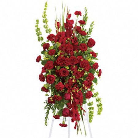 Funeral oval red rose standing spray delivery with roses and gladioli