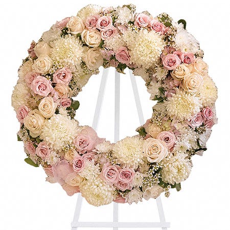 Pink rose and white chrysanthemum open center ring funeral standing spray wreath