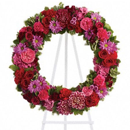 Pink flower funeral ring wreath flower standing spray with easel and dahlias